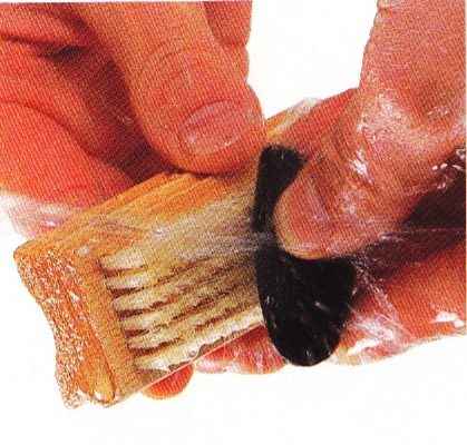 Scrub the mussels thoroughly under cold running water using a stiff brush