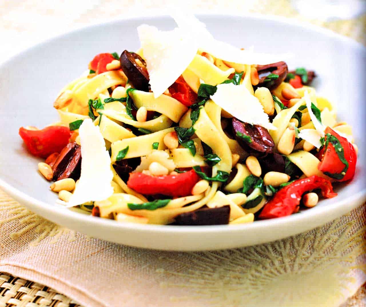 roasted vegetable pasta recipe-Tagliatelle With Sun-Blush Tomatoes And Toasted Pine Nuts